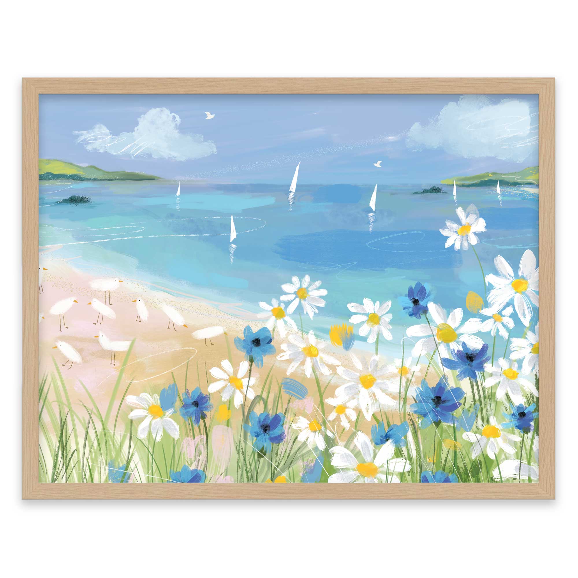 Clifftop Daisies framed print featuring white and blue flowers on a beach with seagulls and sailboats on the blue sea.