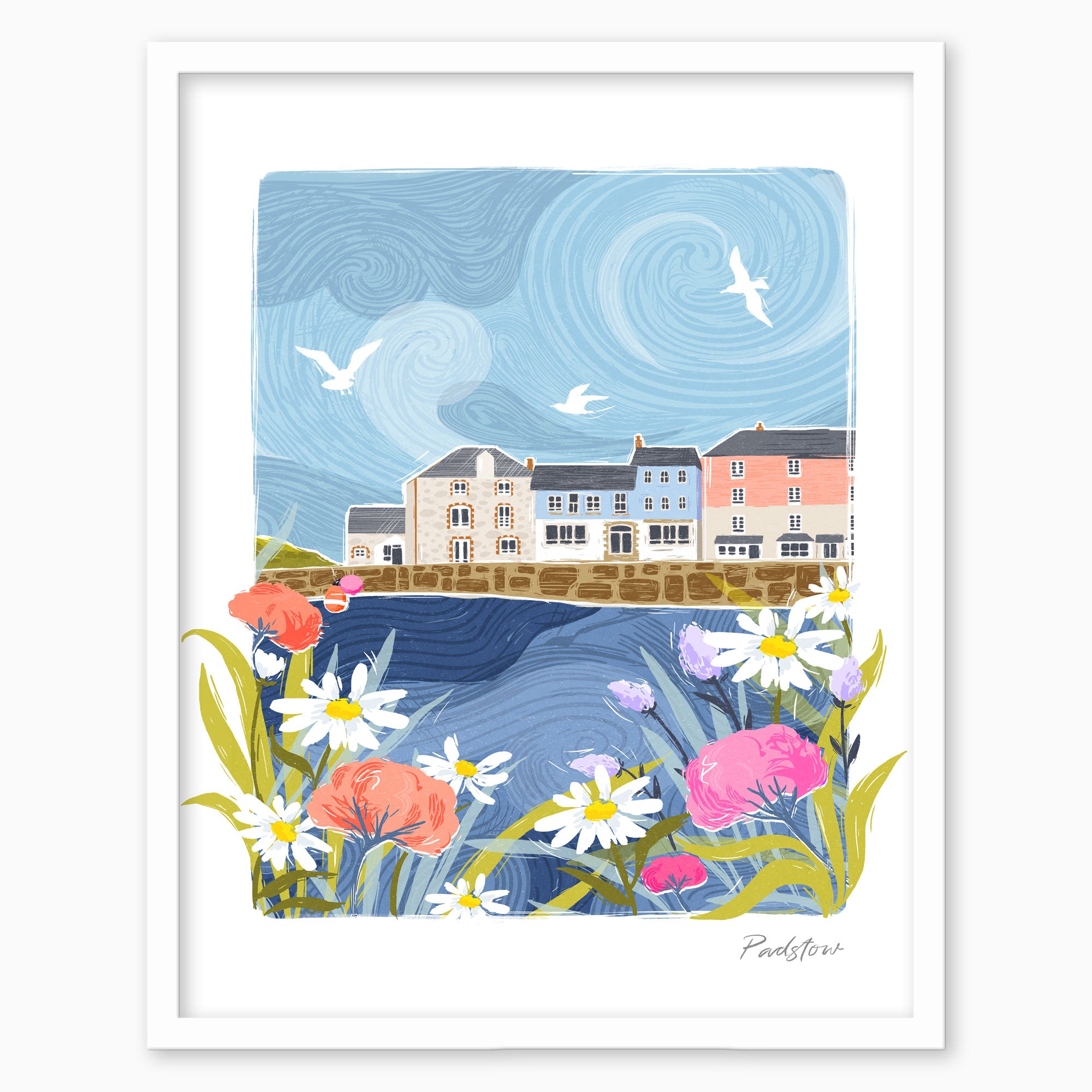 Padstow Lino framed print featuring colourful harbour houses, a swirling blue sky, and foreground daisies in a white frame.