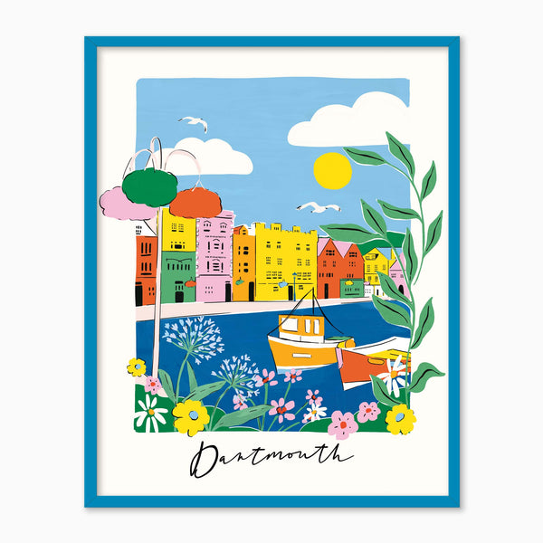 Dartmouth Brights Framed Print featuring colourful harbour houses, boats, and flowers in a vibrant blue frame.