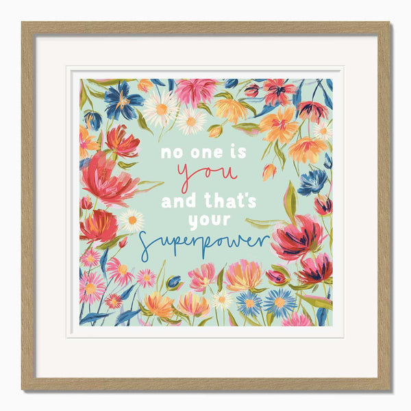 Bloom Bravely Framed Print featuring colourful floral illustrations and the text no one is you and that's your superpower.