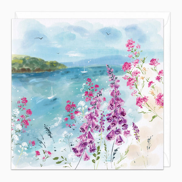 Coastal Foxgloves greeting card featuring a watercolour scene of pink foxgloves by a blue sea with sailing boats.