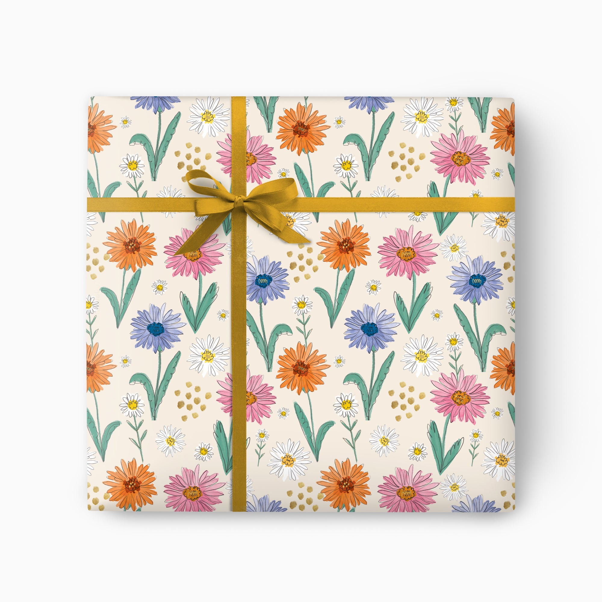 Painted Petal Garden wrapping paper featuring colourful floral illustrations on a cream background with a gold ribbon bow.