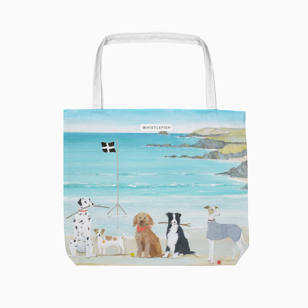 Hannah Cole Man's Best Friend tote bag featuring five dogs on a beach with a Cornish flag and blue sea background.