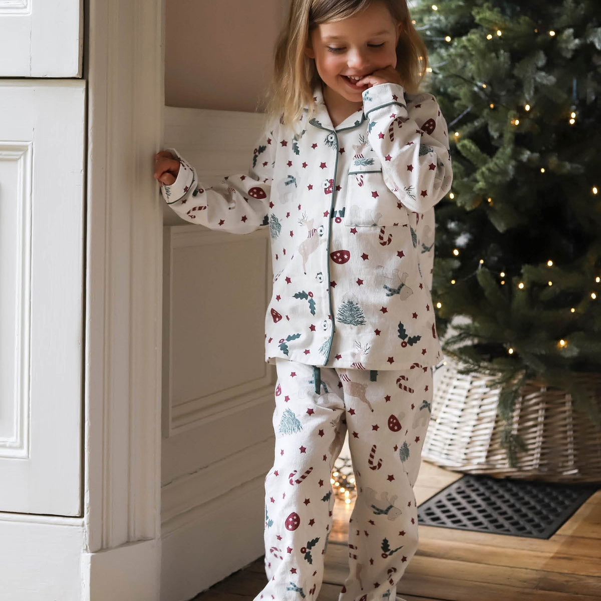 XPJ05CCA - Christmas Carousel Children's Flannel Pyjamas 4 To 5Y
