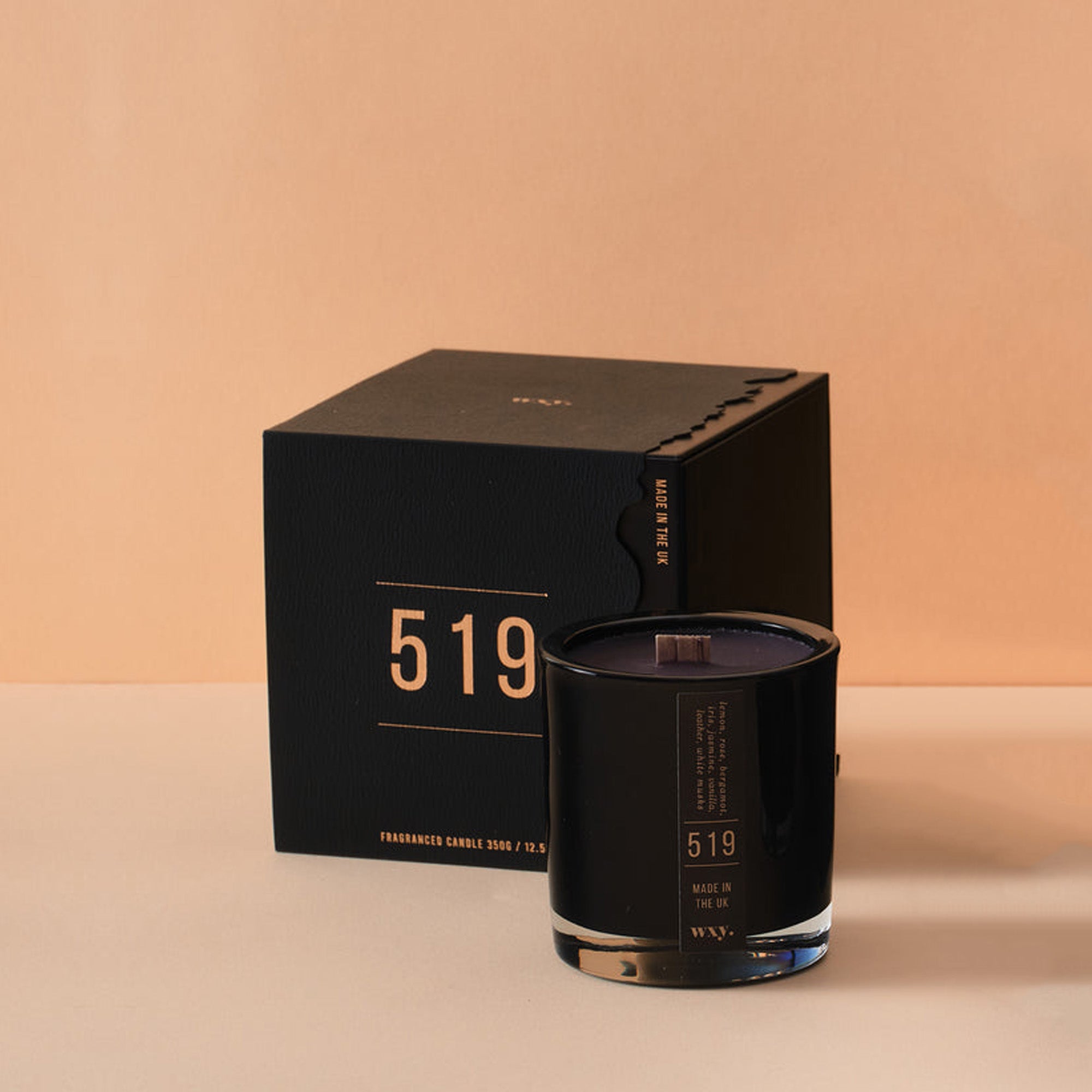 WXYUM0501 - Umbra 5oz Candle 519 Lemon White Musk and Leather