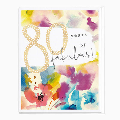 80 & Fabulous birthday card with gold polka-dot numbers over a colourful watercolour floral background.