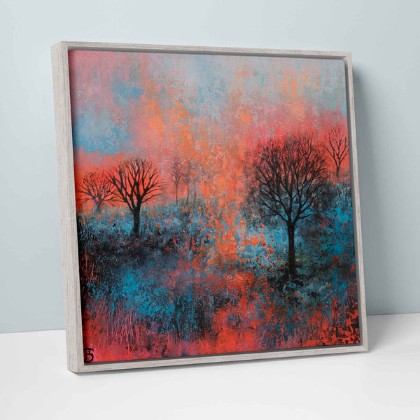 Canvas - JSC18F - No.6 of Rural Landscapes Medium Framed Canvas - A world of natural fantasy unfolds in this contemporary landscape canvas, as fiery tones of red and orange wash into the deep vibrant blues. The dark contour of the trees surrounded by the vibrant colours gives this canvas a dramatic look, making it perfect as a center piece becoming the focus of a space.