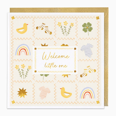 Coastal Patchwork Welcome Little One card featuring a yellow and blue baby-themed quilt pattern with a gold envelope.