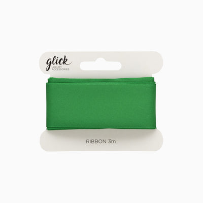 A 3-metre roll of vibrant green satin ribbon wrapped around a white cardboard display card.