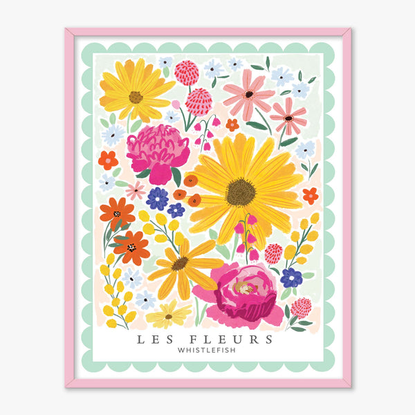 Les Rose Fleurs framed print featuring a colourful floral illustration with a scalloped mint green border in a pink frame.