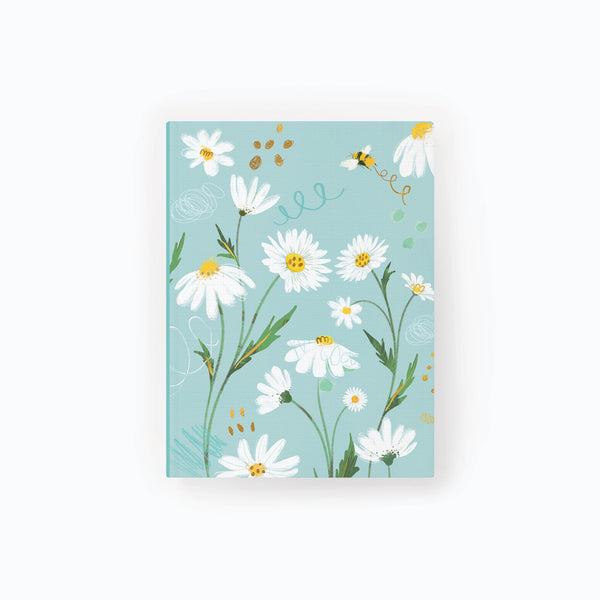 Daisies Notebook featuring white daisy illustrations and a small bee on a light blue background.