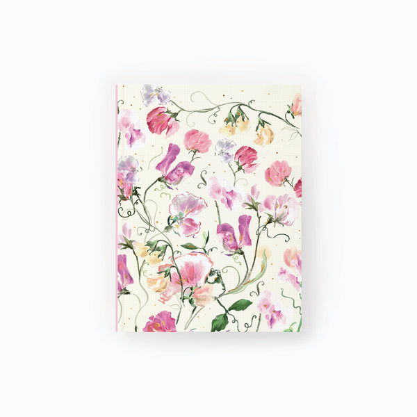 Sweet Peas notebook featuring a delicate watercolour floral pattern of pink, purple and yellow flowers on a grid background.