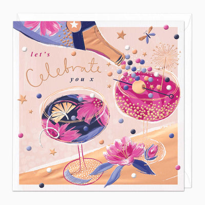 Cocktails Celebrate card featuring a champagne bottle, two cocktail glasses, pink flowers, and stars on a peach background.
