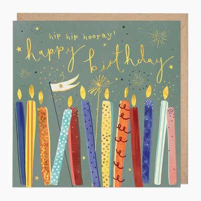 Colourful candles birthday card with a sage green background, gold lettering, and a small flag on a brown envelope.