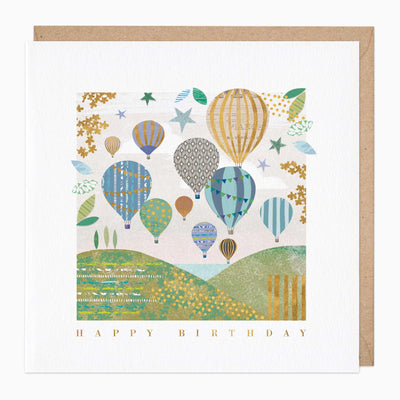 Hot Air Balloon Happy Birthday card featuring colourful patterned balloons over green hills with a brown envelope.