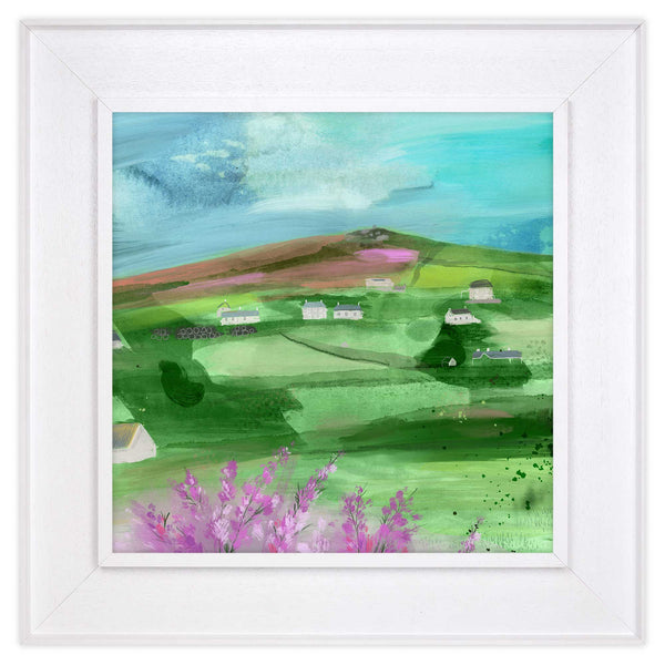 St Agnes Beacon tray framed canvas featuring a vibrant green landscape with white cottages and purple heather.
