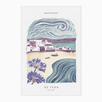 St Ives Arched Lino tea towel featuring a coastal scene with blue flowers, a harbour, boats, and a swirling sky.