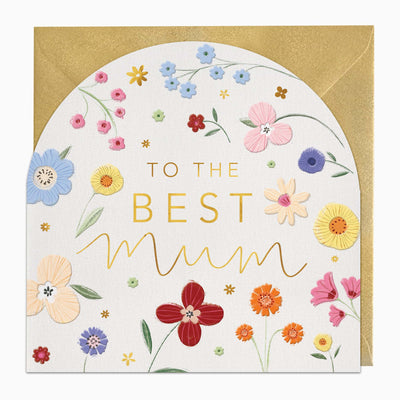 To The Best Mum greeting card with an arched top, colourful floral illustrations, and a gold envelope.